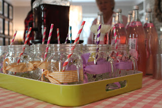 mason jar glasses with ribbon and paper straw