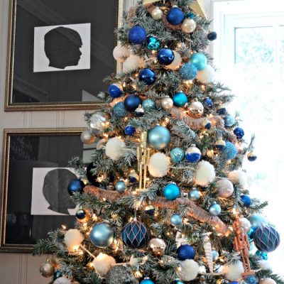 Decorations of Blue on White Christmas Tree